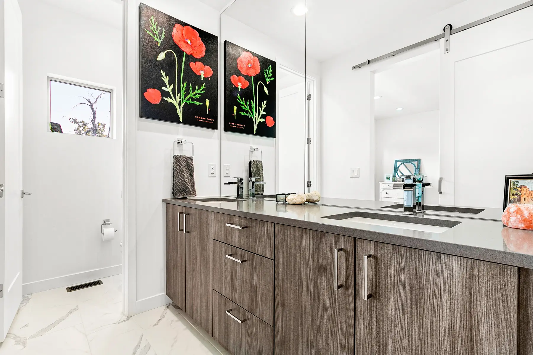 Modern bathroom vanity with red poppy art