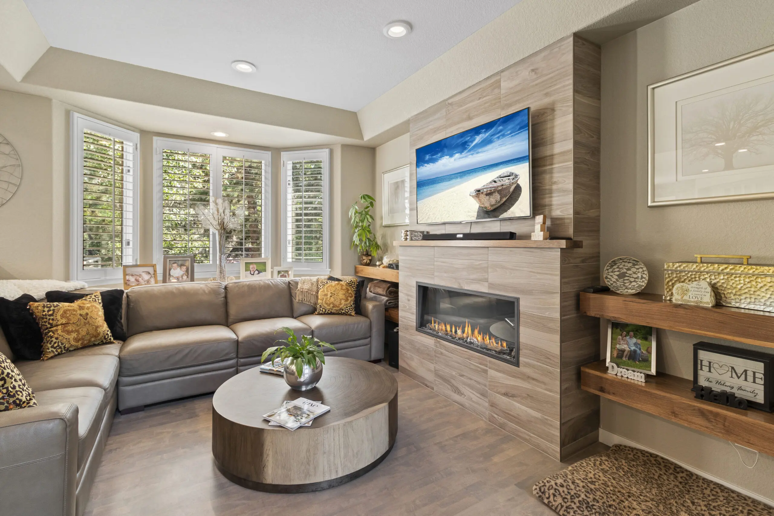 Cozy modern living room with fireplace and TV