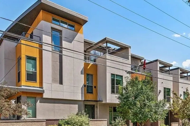 Modern apartment building with angular design.
